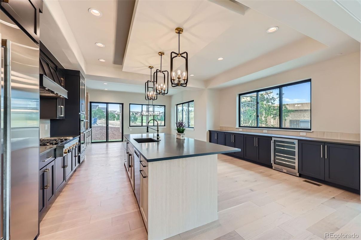 Chandelier, Interior, Kitchen, Pendant Lights, Recessed Lighting, Stainless Steel Appliances, Wood Texture Flooring