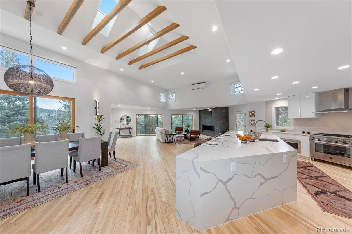 Dining room, Interior, Kitchen, Living room, Pendant Lights, Recessed Lighting, Stainless Steel Appliances, Wood Texture Flooring