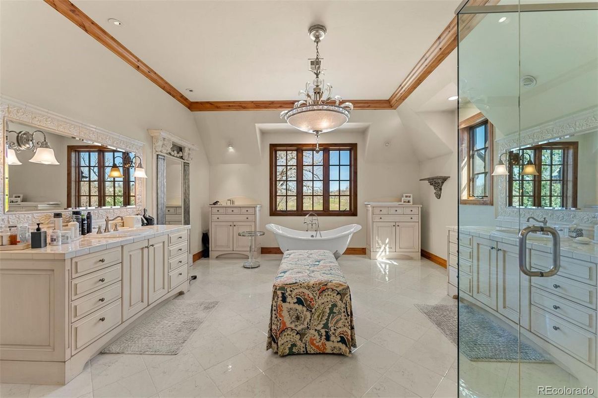 Bathroom, Dual Sink Vanities, Free Standing Baths, Glass Shower, Interior, Pendant Lights, Recessed Lighting, Tile Countertops, Wooden Beams