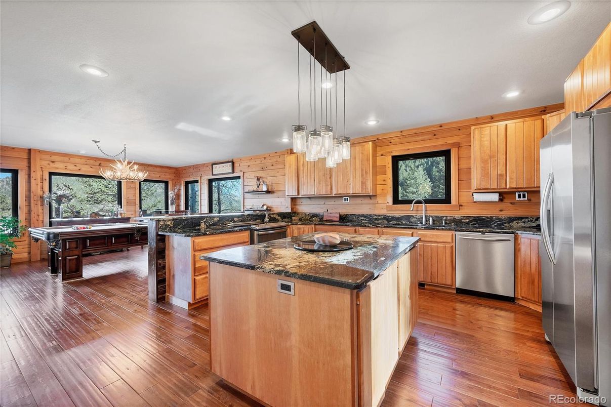 Chandelier, Interior, Kitchen, Pendant Lights, Recessed Lighting, Stainless Steel Appliances, Wood Texture Flooring