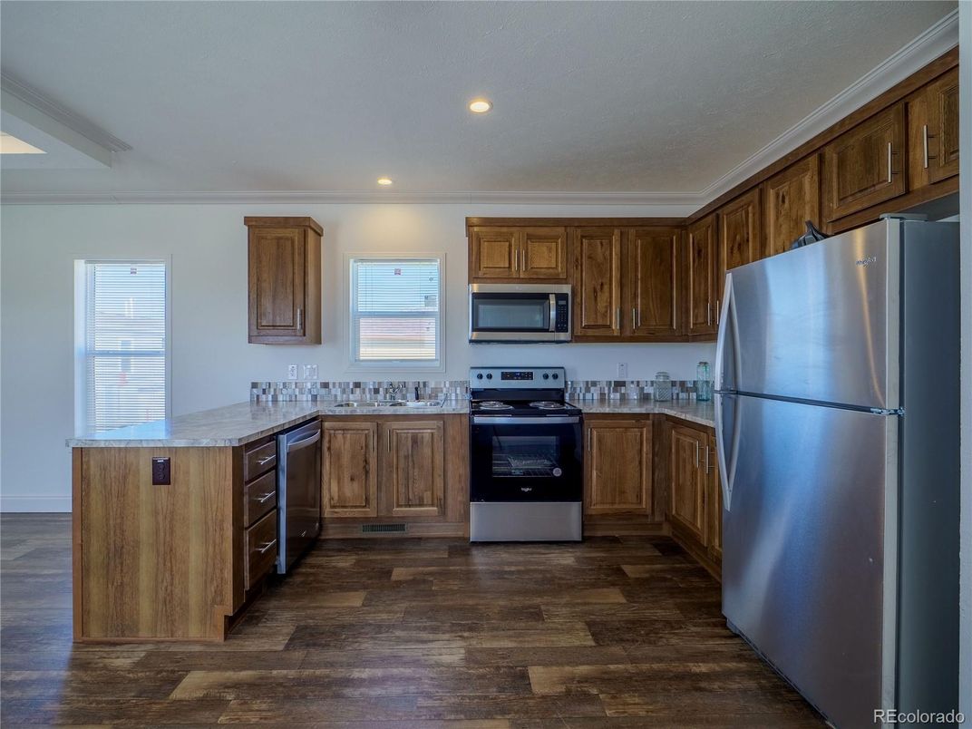 Interior, Kitchen, Recessed Lighting, Stainless Steel Appliances, Wood Texture Flooring