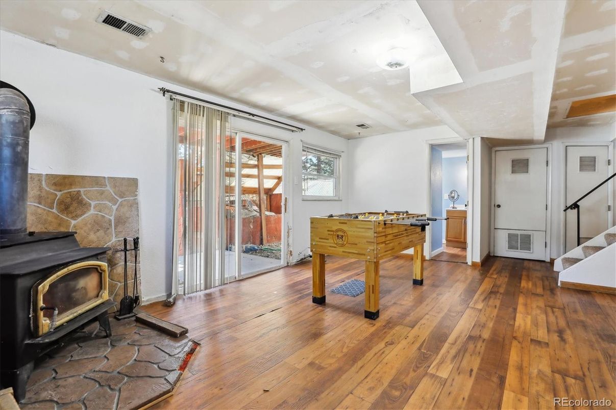 Fireplace, Game Room, Interior, Wood Texture Flooring
