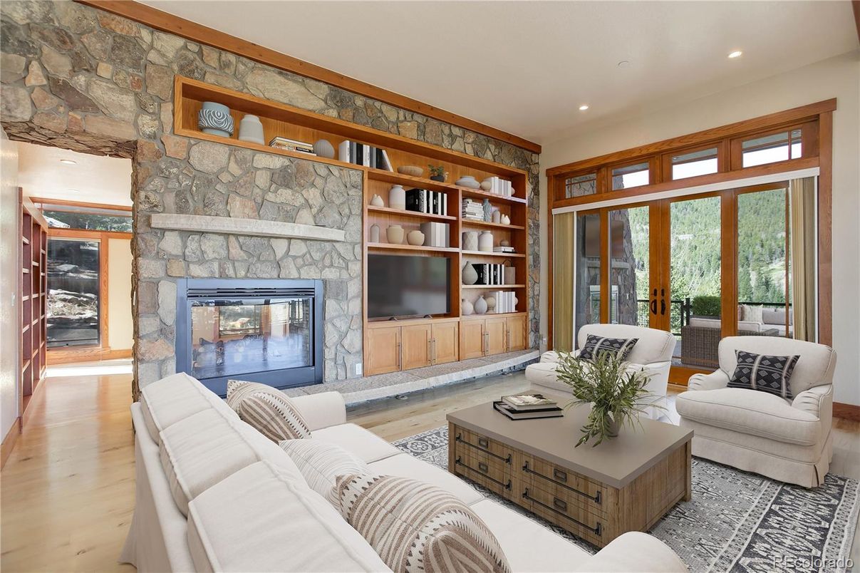 Fireplace, Interior, Living room, Recessed Lighting, Stone Walls, Wood Texture Flooring