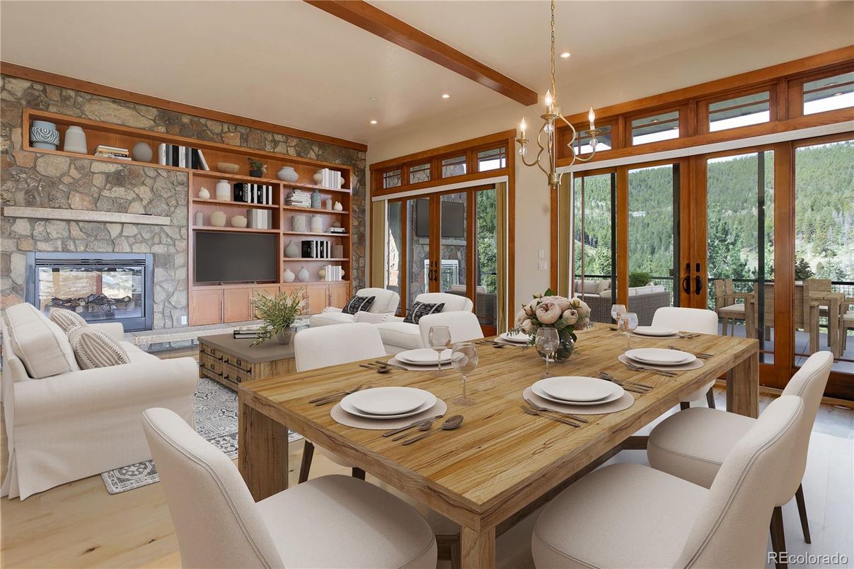 Chandelier, Dining room, Fireplace, Interior, Living room, Recessed Lighting, Stone Walls, Wooden Beams, Wood Texture Flooring