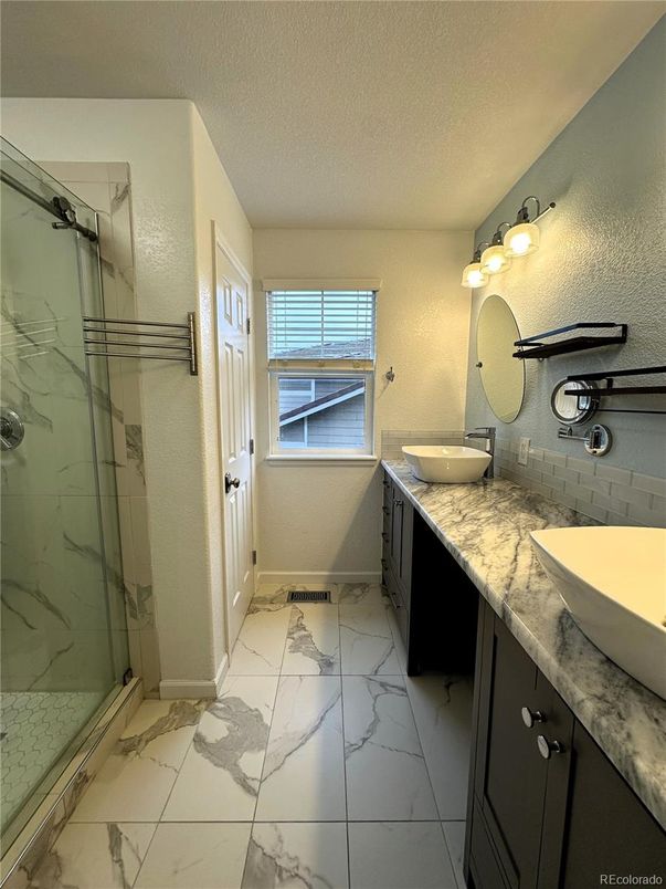 Bathroom, Dual Sink Vanities, Glass Shower, Interior, Marble, Marble Walls