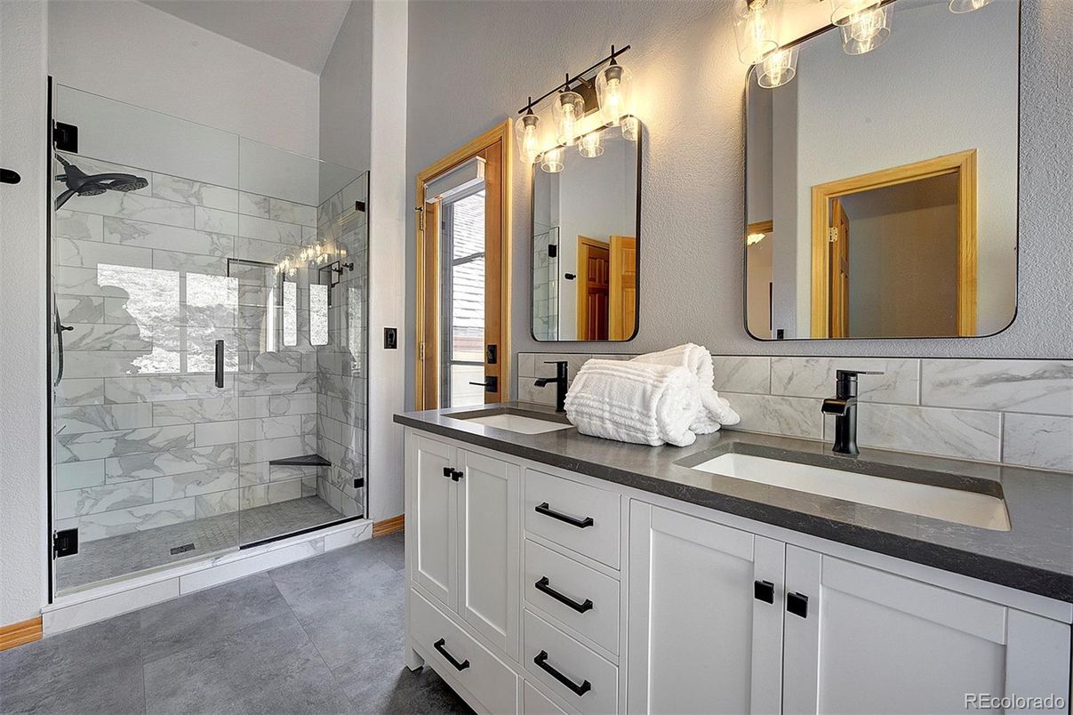 Bathroom, Dual Sink Vanities, Glass Shower, Interior, Marble Walls