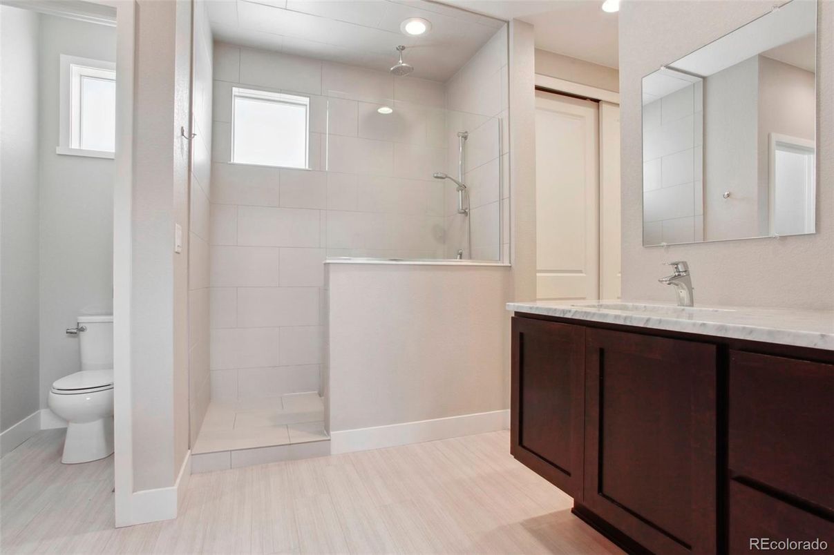 Bathroom, Glass Shower, Interior, Recessed Lighting, Wood Texture Flooring