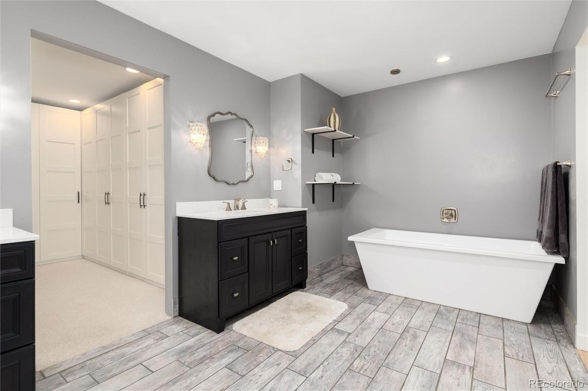Bathroom, Dual Sink Vanities, Free Standing Baths, Interior, Recessed Lighting, Wood Texture Flooring