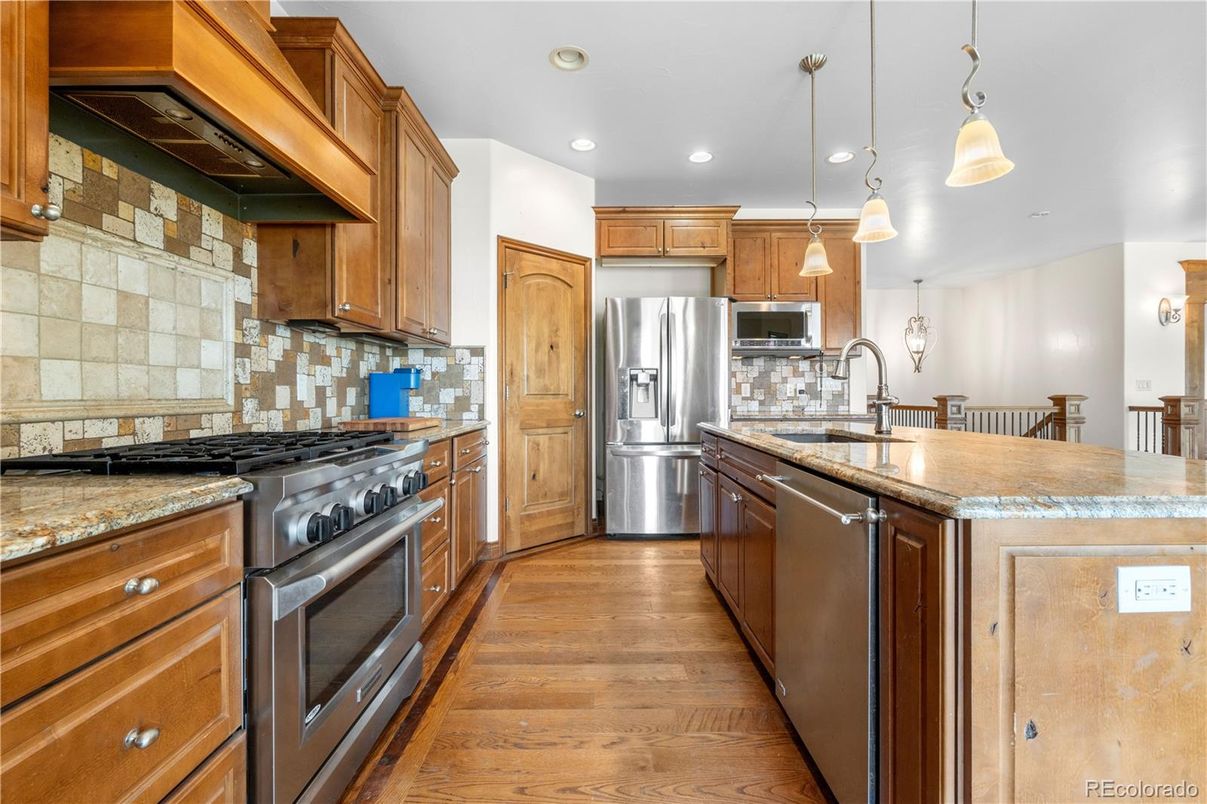 Interior, Kitchen, Pendant Lights, Recessed Lighting, Stainless Steel Appliances, Wood Texture Flooring