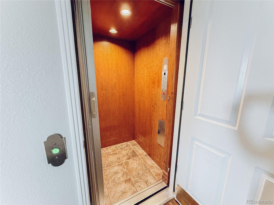 Elevator, Interior, Recessed Lighting, Wooden Ceilings, Wooden Walls