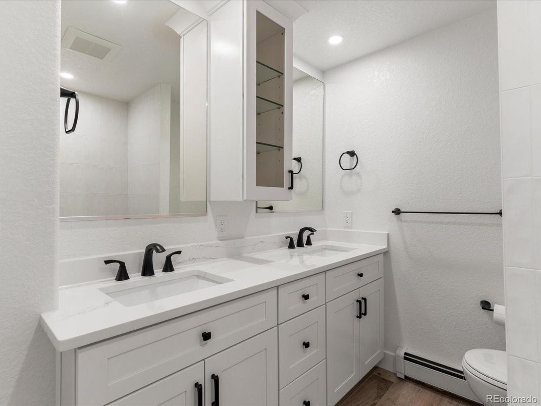 Bathroom, Dual Sink Vanities, Interior, Recessed Lighting, Wood Texture Flooring