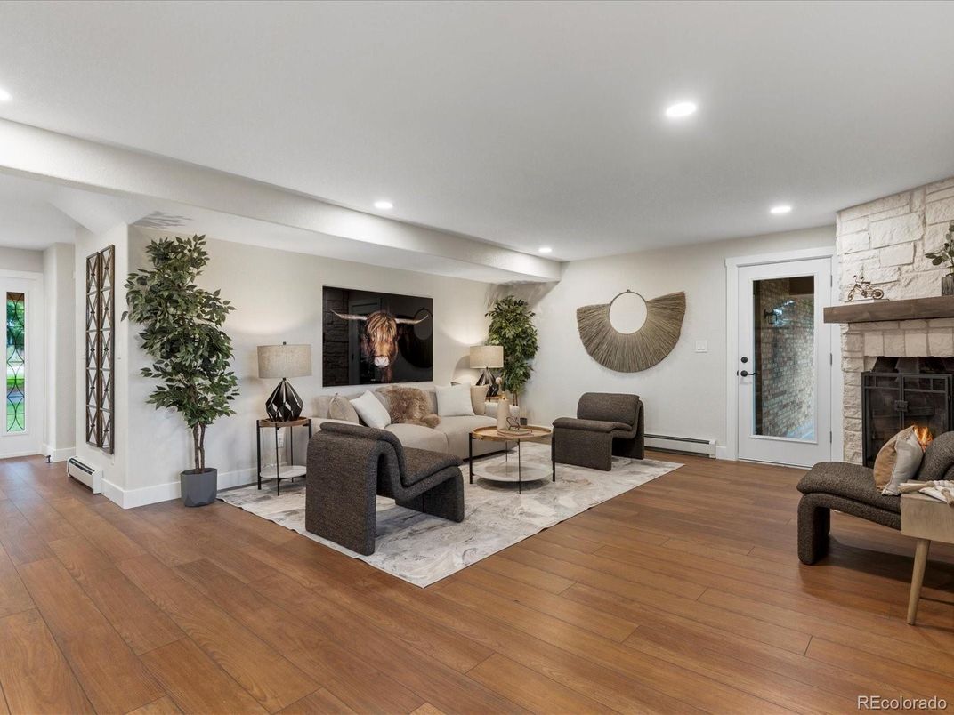 Fireplace, Interior, Living room, Recessed Lighting, Stone Walls, Wood Texture Flooring