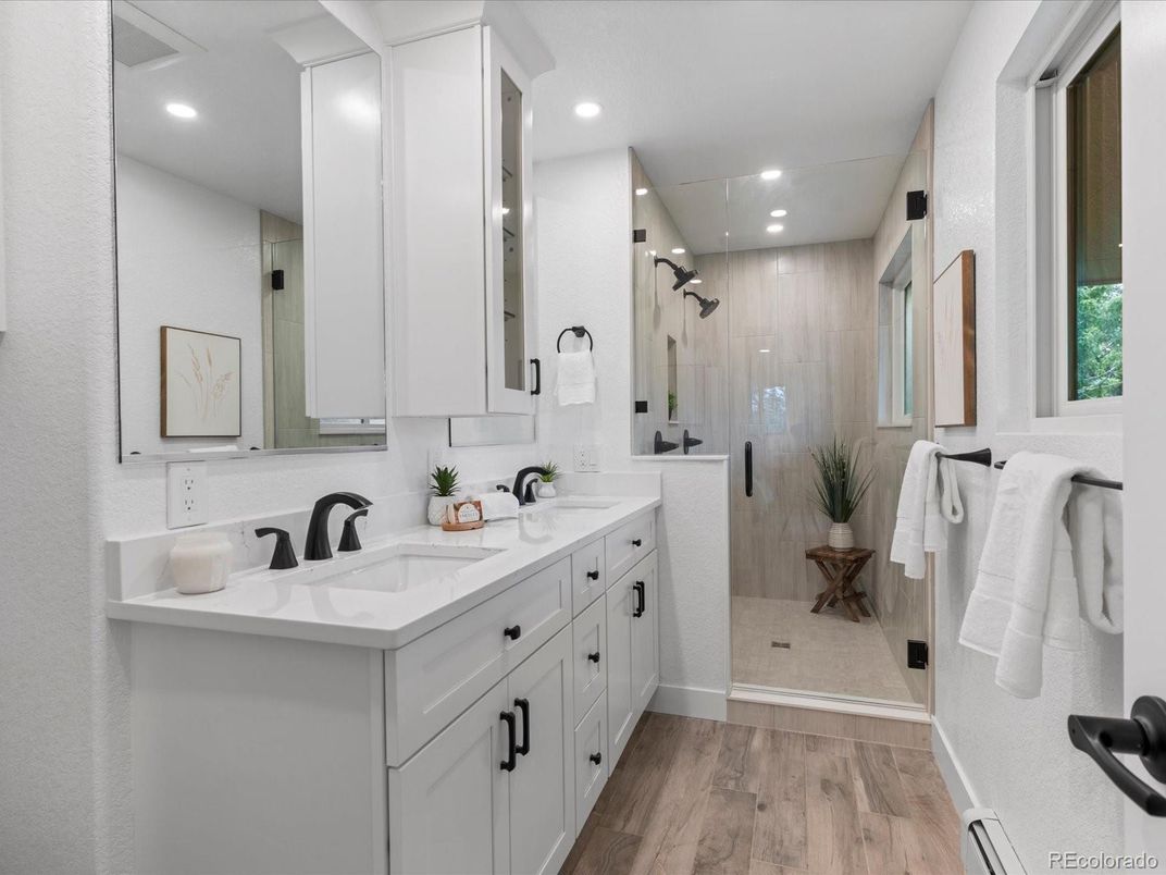 Bathroom, Dual Sink Vanities, Glass Shower, Interior, Recessed Lighting, Wood Texture Flooring