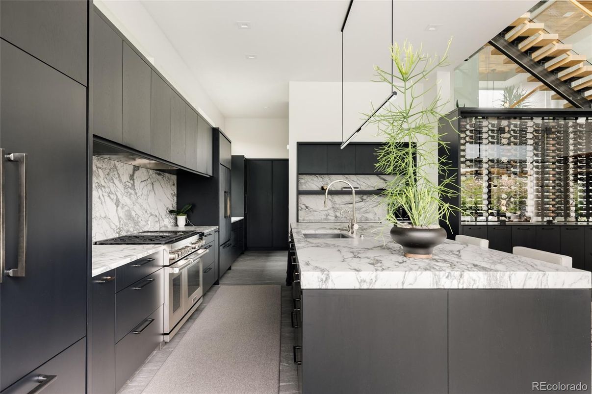 Interior, Kitchen, Marble Walls, Pendant Lights, Recessed Lighting, Stainless Steel Appliances