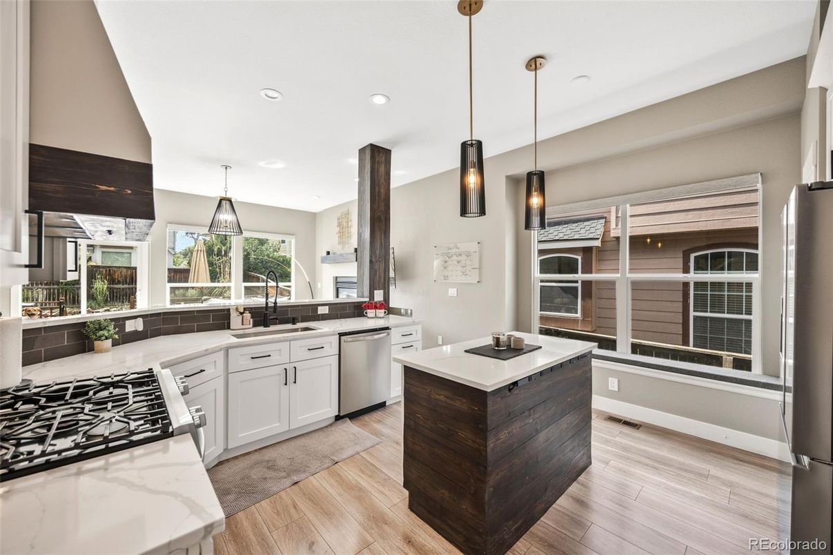 Interior, Kitchen, Pendant Lights, Recessed Lighting, Stainless Steel Appliances, Wood Texture Flooring