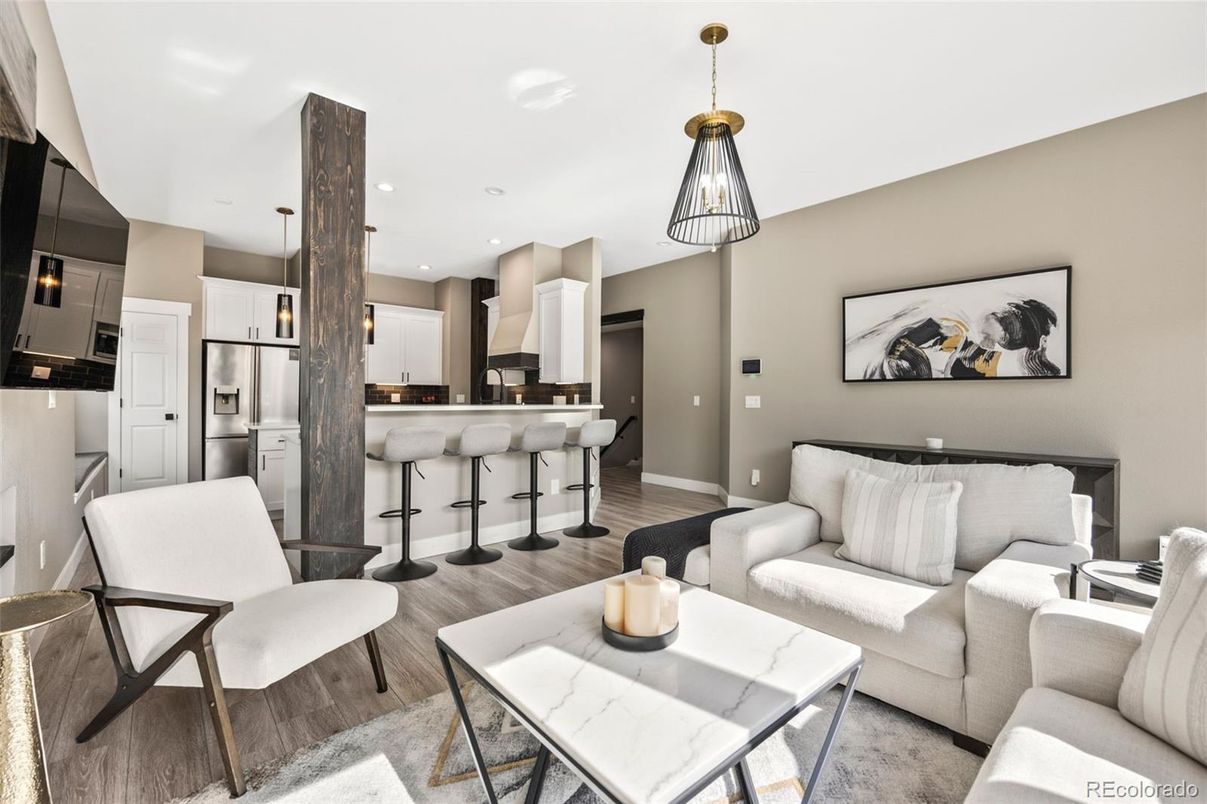 Dining room, Interior, Kitchen, Living room, Pendant Lights, Recessed Lighting, Stainless Steel Appliances, Wood Texture Flooring