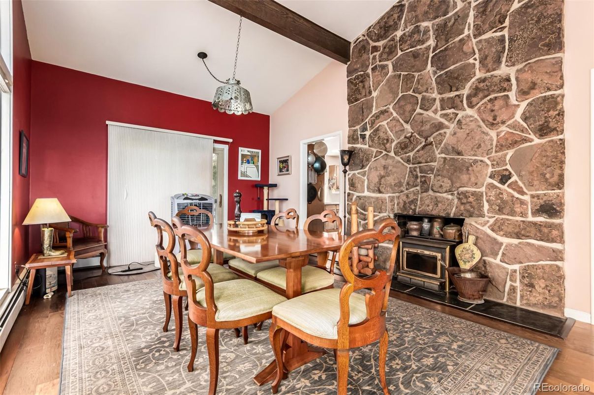 Dining room, Fireplace, Interior, Pendant Lights, Stone Walls, Wooden Beams, Wood Texture Flooring