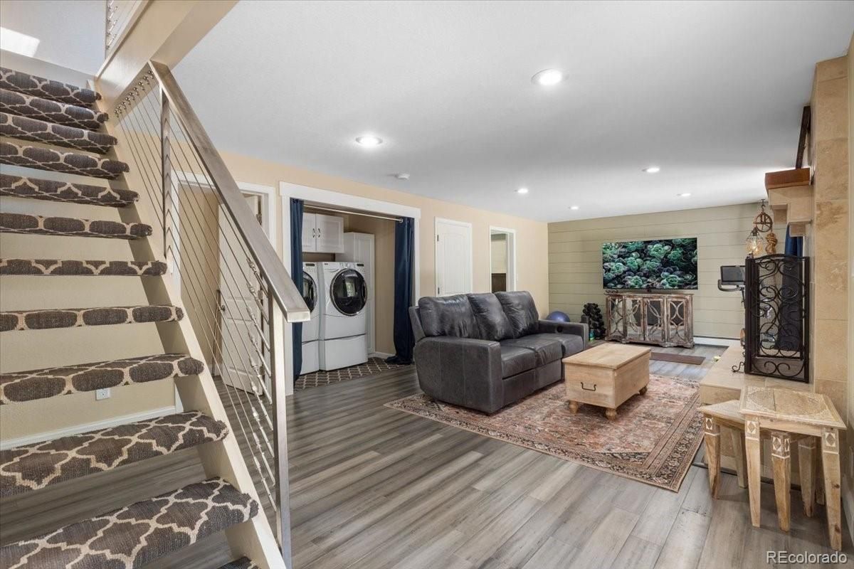 Fireplace, Interior, Living room, Recessed Lighting, Washer, Wood Texture Flooring