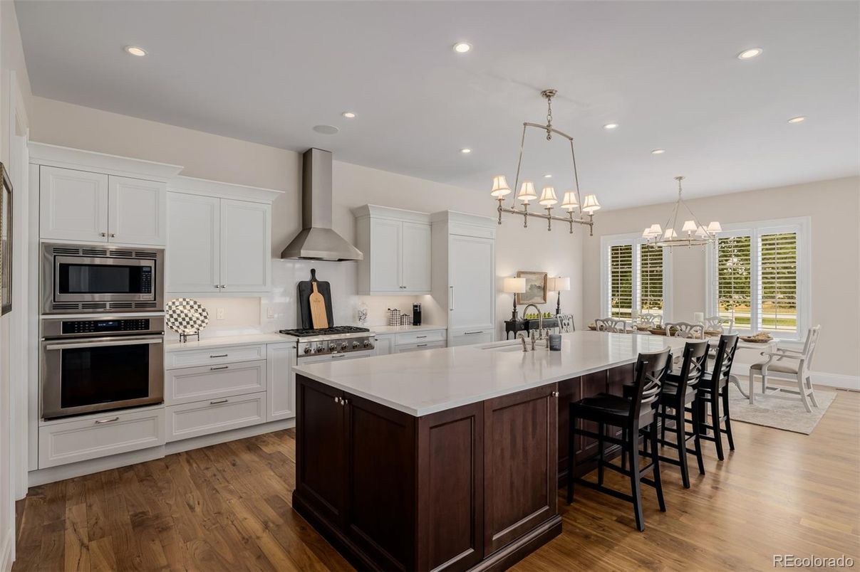 Chandelier, Interior, Kitchen, Pendant Lights, Recessed Lighting, Stainless Steel Appliances, Wood Texture Flooring