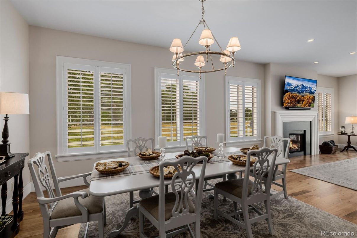 Chandelier, Dining room, Fireplace, Interior, Recessed Lighting, Wood Texture Flooring