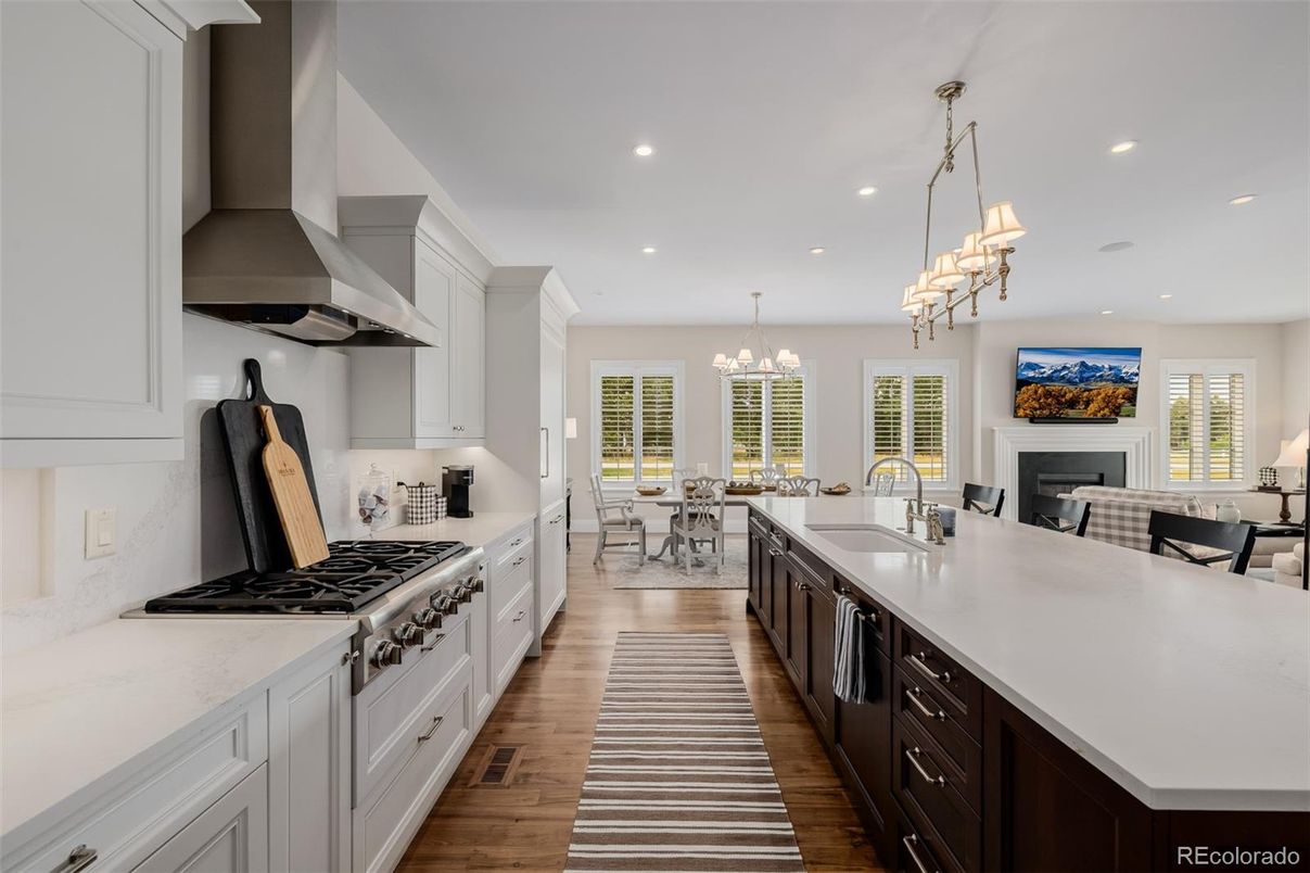 Chandelier, Dining room, Fireplace, Interior, Kitchen, Pendant Lights, Recessed Lighting, Wood Texture Flooring