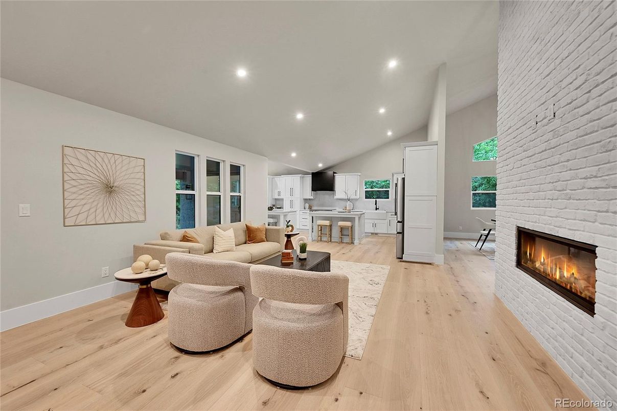 Fireplace, Interior, Kitchen, Living room, Recessed Lighting, Stone Walls, Wood Texture Flooring