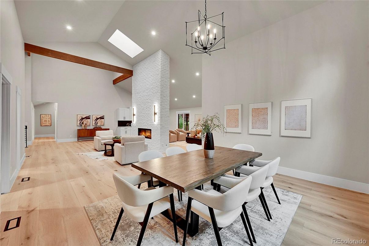 Dining room, Fireplace, Interior, Living room, Pendant Lights, Recessed Lighting, Stone Walls, Wooden Beams, Wood Texture Flooring