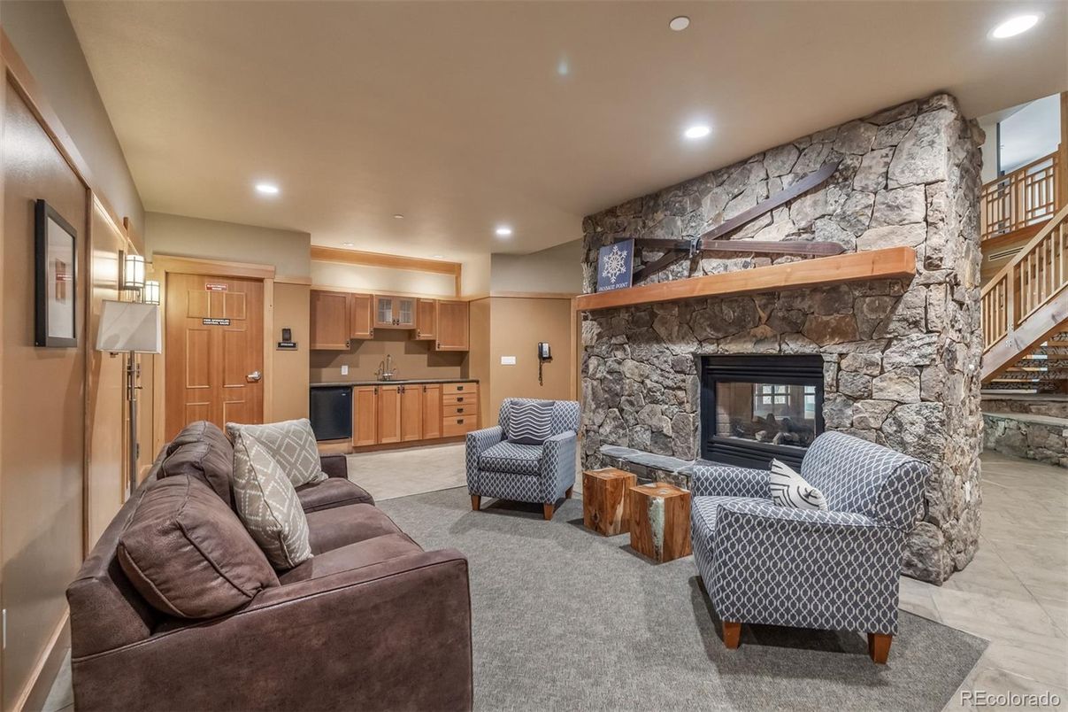 Fireplace, Interior, Living room, Marble, Recessed Lighting, Stone Walls