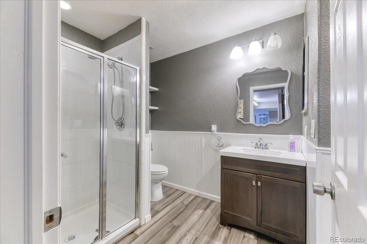 Bathroom, Glass Shower, Interior, Recessed Lighting, Wood Texture Flooring