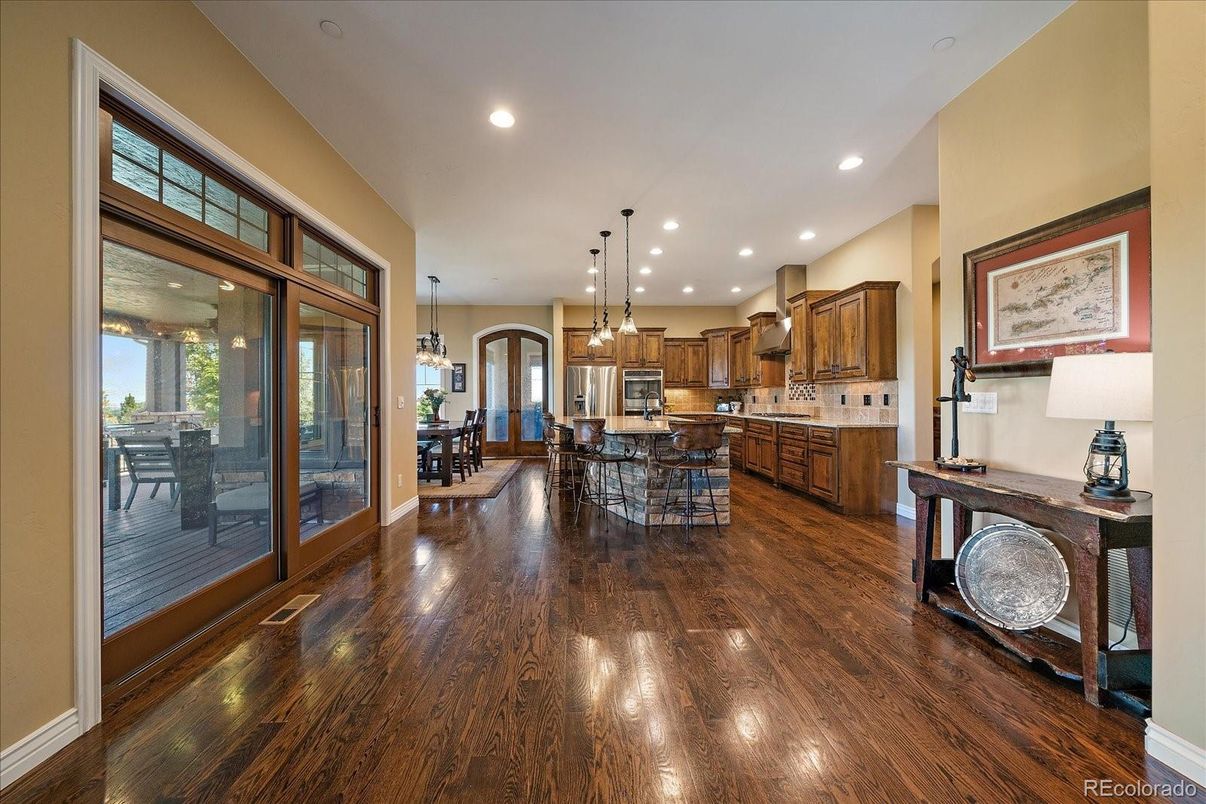 Dining room, Interior, Kitchen, Pendant Lights, Recessed Lighting, Stainless Steel Appliances, Wood Texture Flooring