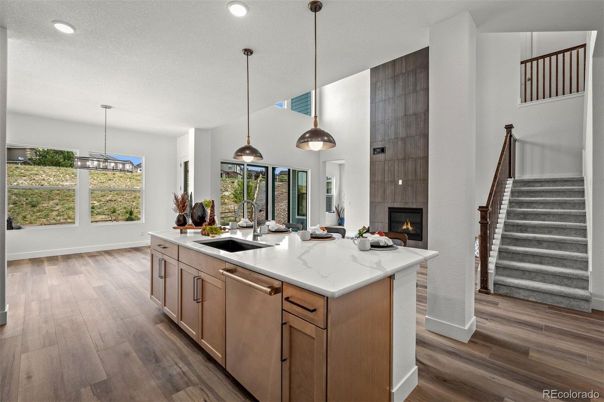 Dining room, Fireplace, Interior, Kitchen, Pendant Lights, Recessed Lighting, Wood Texture Flooring