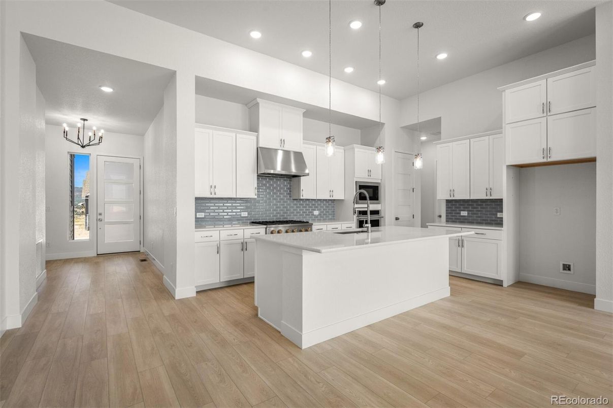 Chandelier, Interior, Kitchen, Pendant Lights, Recessed Lighting, Stainless Steel Appliances, Wood Texture Flooring