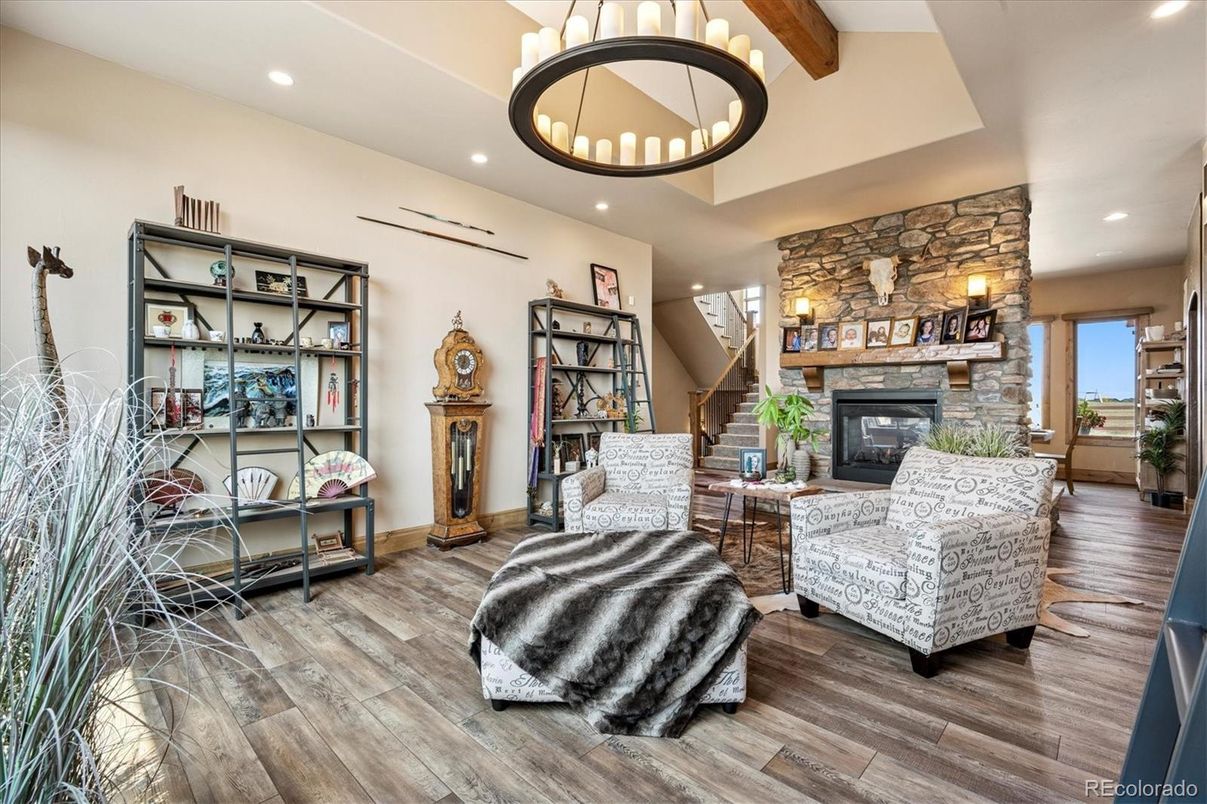 Fireplace, Interior, Living room, Pendant Lights, Recessed Lighting, Stone Walls, Wooden Beams, Wood Texture Flooring