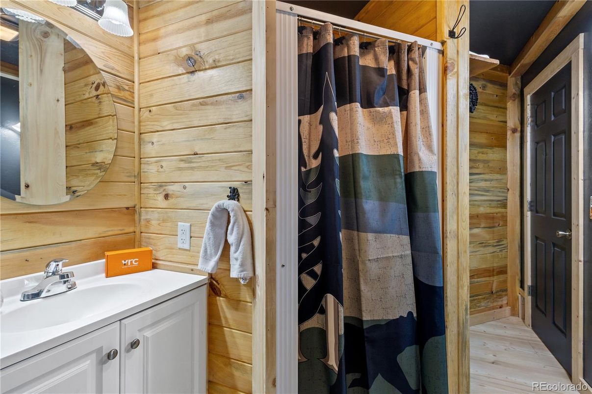Bathroom, Interior, Washer, Wood Texture Flooring, Wooden Walls