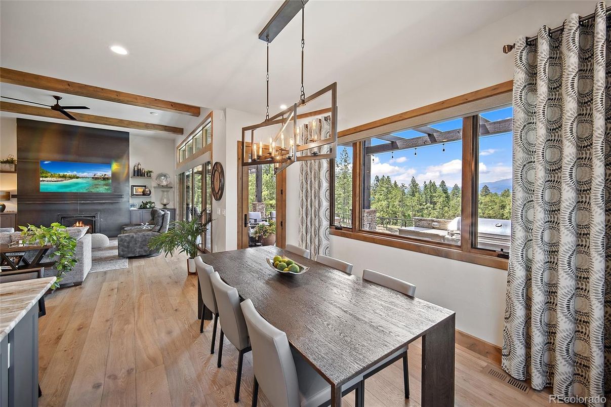 Dining room, Fireplace, Interior, Living room, Pendant Lights, Recessed Lighting, Wood Texture Flooring