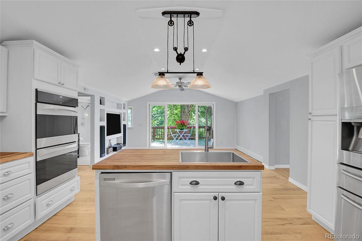 Interior, Kitchen, Pendant Lights, Recessed Lighting, Stainless Steel Appliances, Wood Texture Flooring