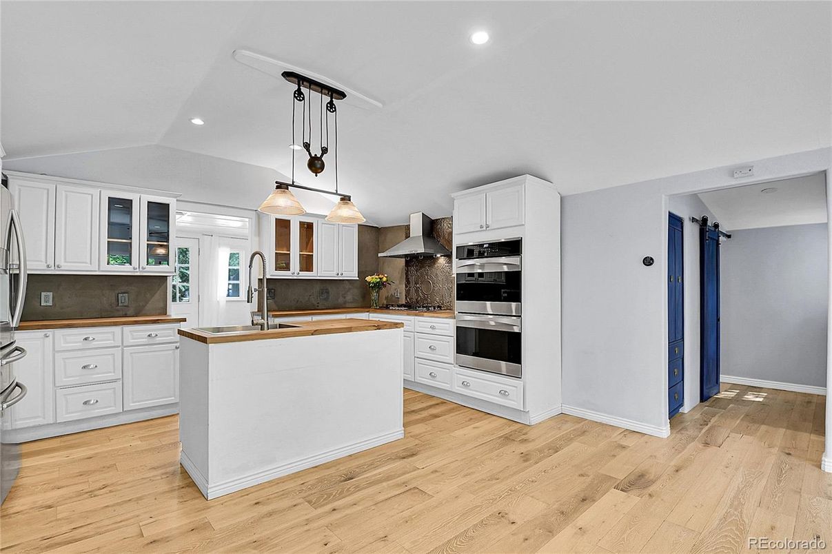 Interior, Kitchen, Pendant Lights, Recessed Lighting, Stainless Steel Appliances, Wood Texture Flooring