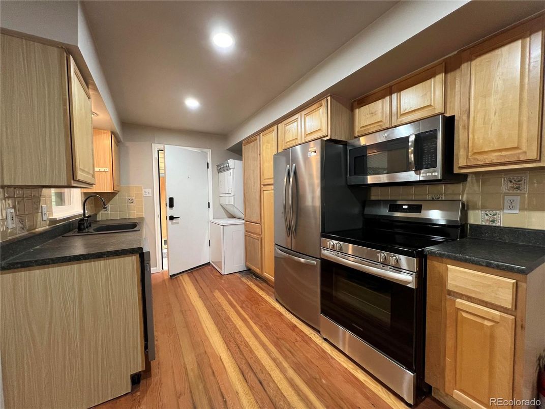 Interior, Kitchen, Recessed Lighting, Stainless Steel Appliances, Washer, Wood Texture Flooring