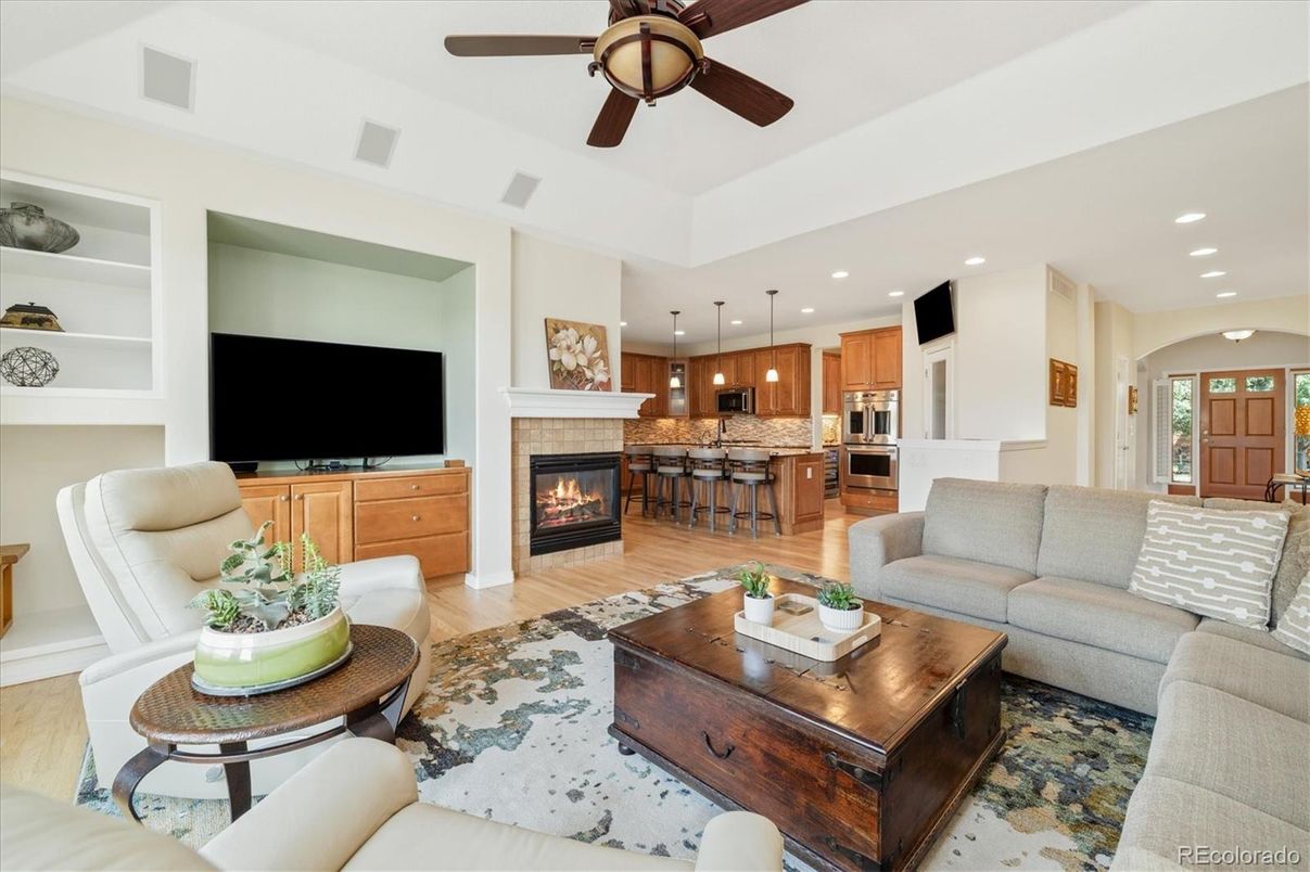 Fireplace, Interior, Kitchen, Living room, Pendant Lights, Recessed Lighting, Stainless Steel Appliances, Wood Texture Flooring
