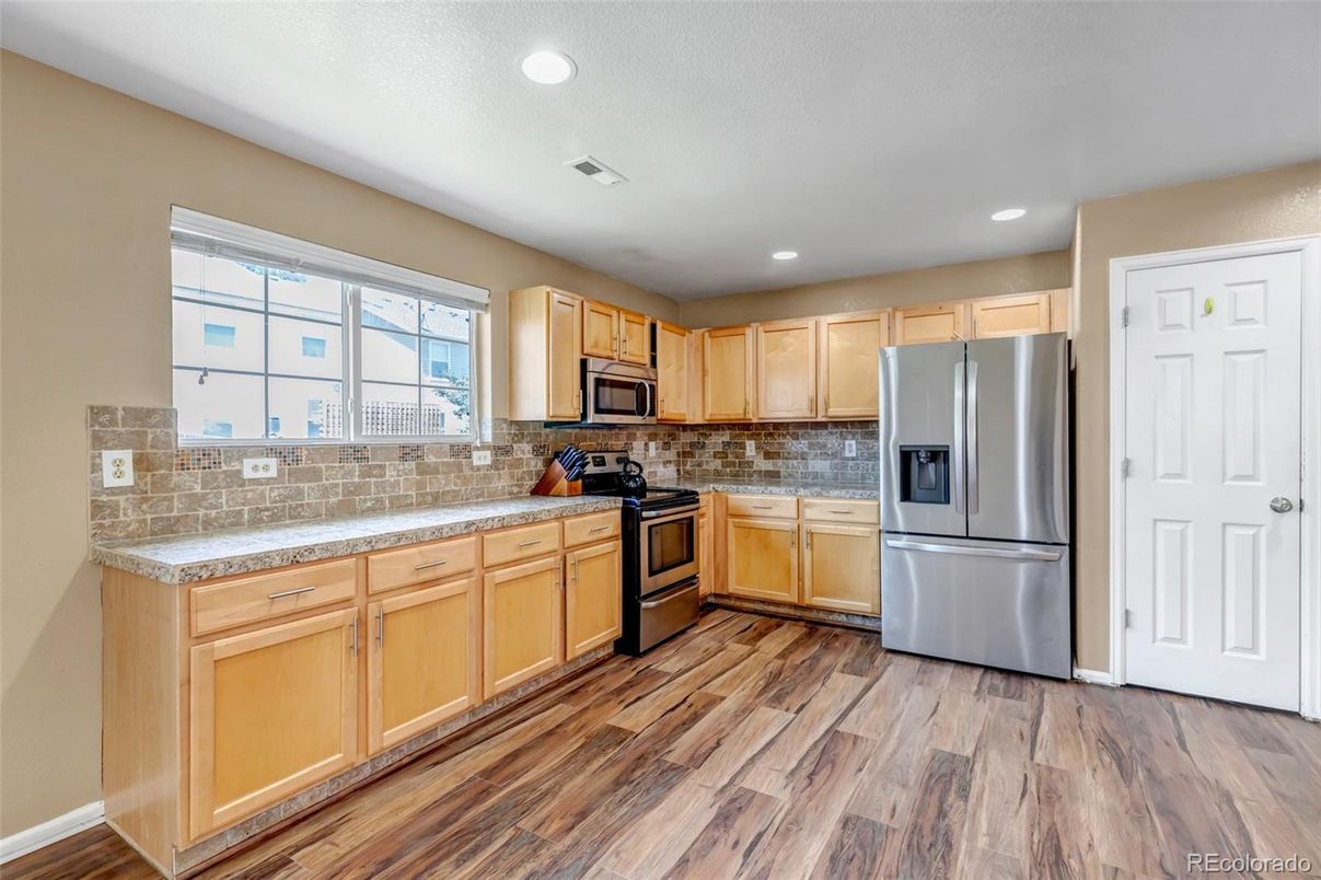 Interior, Kitchen, Recessed Lighting, Stainless Steel Appliances, Wood Texture Flooring