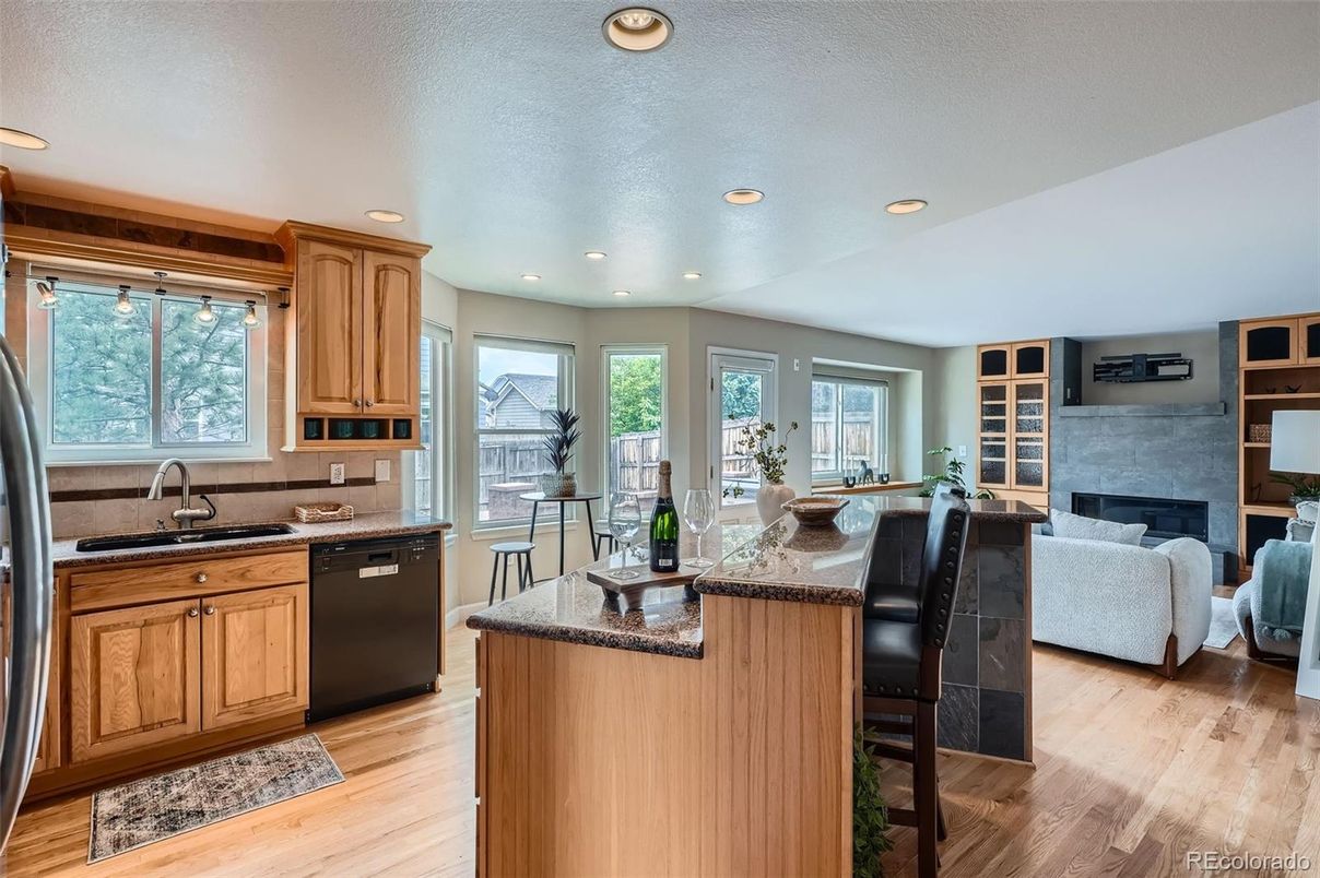 Fireplace, Interior, Kitchen, Recessed Lighting, Wood Texture Flooring