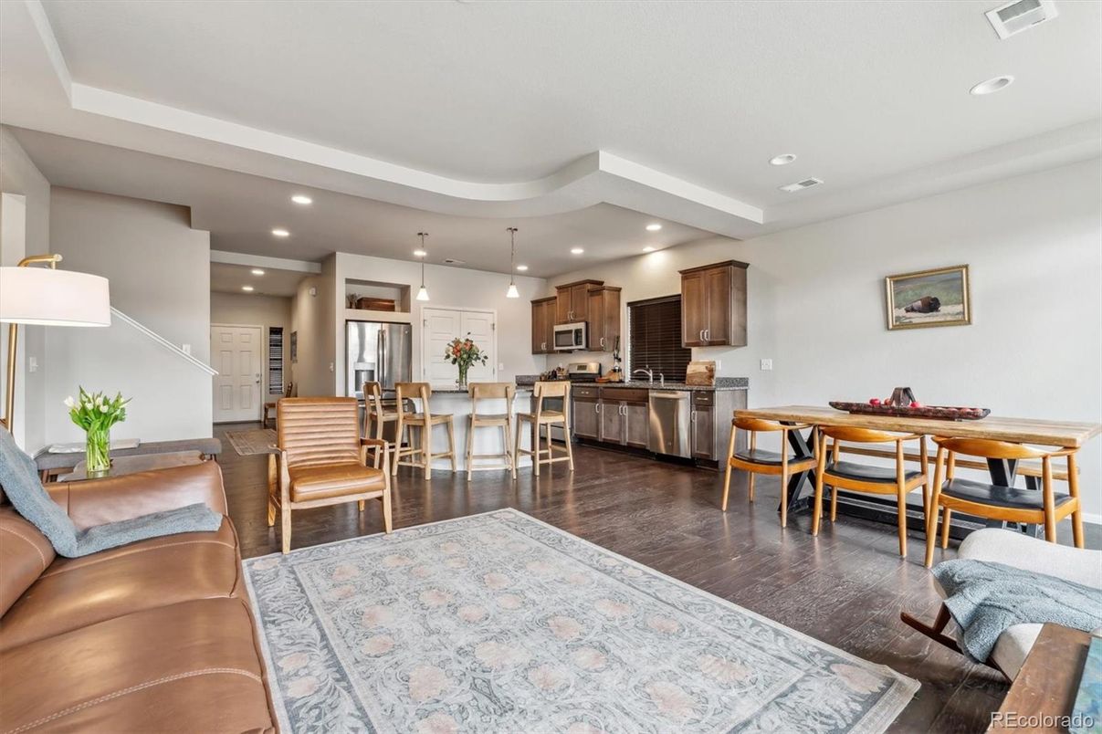 Dining room, Interior, Kitchen, Living room, Pendant Lights, Recessed Lighting, Stainless Steel Appliances, Wood Texture Flooring