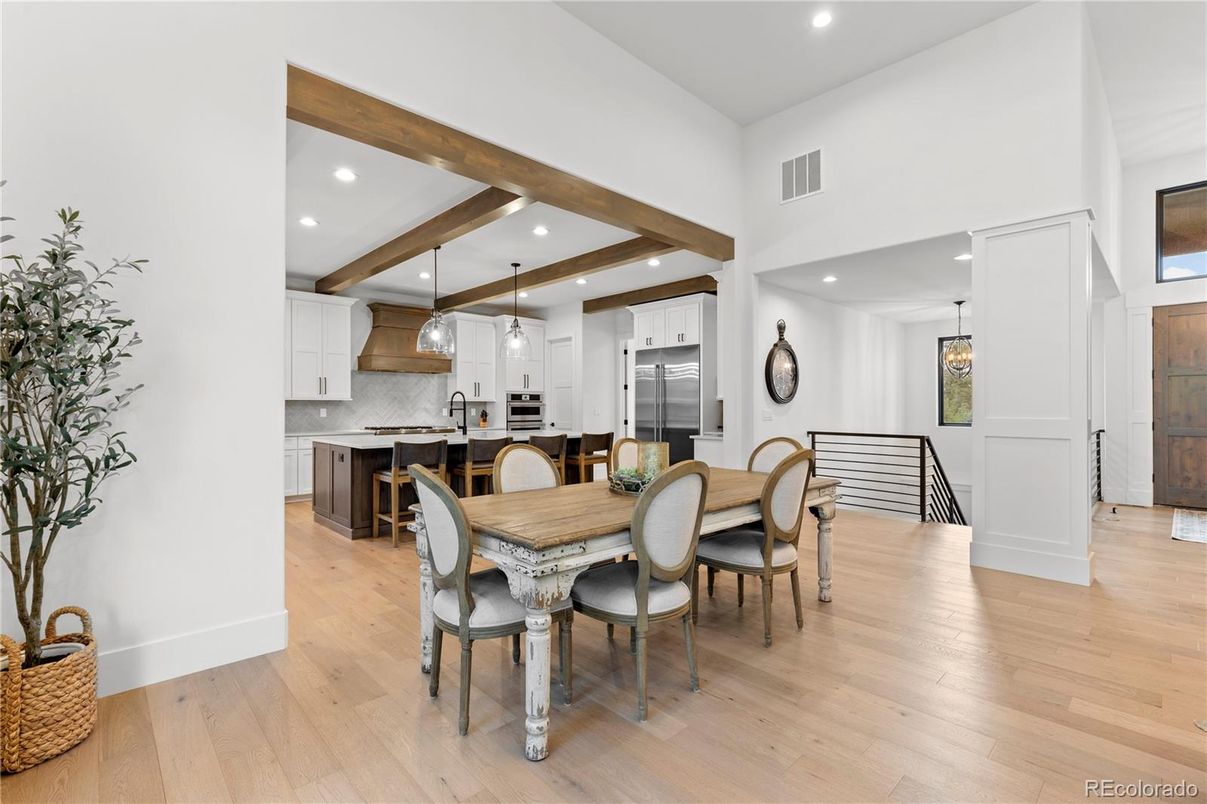 Dining room, Interior, Kitchen, Pendant Lights, Recessed Lighting, Stainless Steel Appliances, Wooden Beams, Wood Texture Flooring