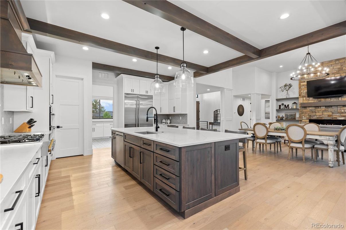 Dining room, Fireplace, Interior, Kitchen, Pendant Lights, Recessed Lighting, Stainless Steel Appliances, Wooden Beams, Wood Texture Flooring