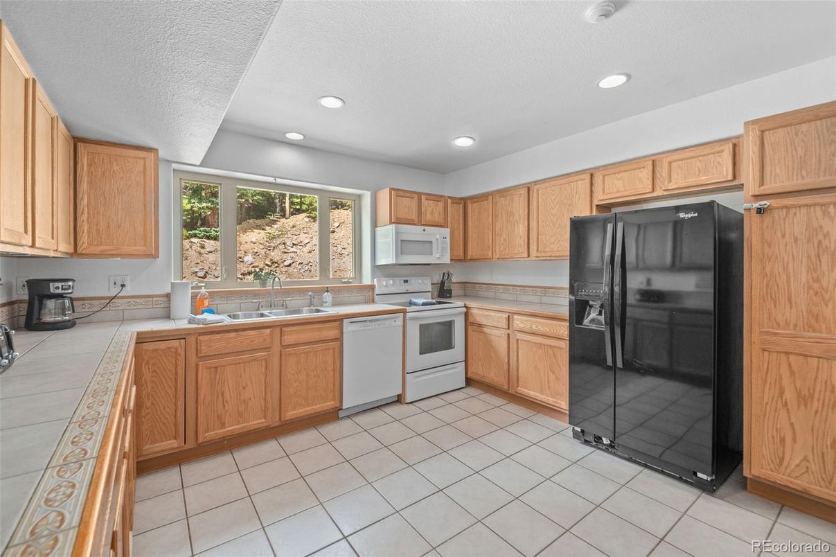 Interior, Kitchen, Recessed Lighting, Tile Countertops