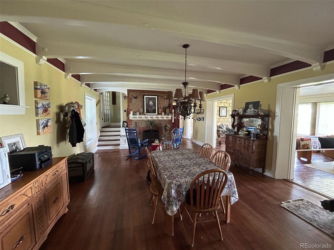 Chandelier, Dining room, Fireplace, Interior, Wood Texture Flooring