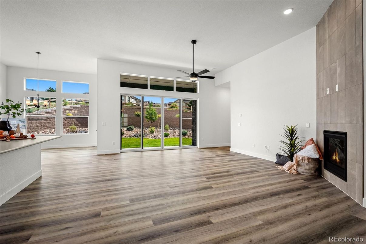 Empty room, Fireplace, Interior, Pendant Lights, Recessed Lighting, Wood Texture Flooring