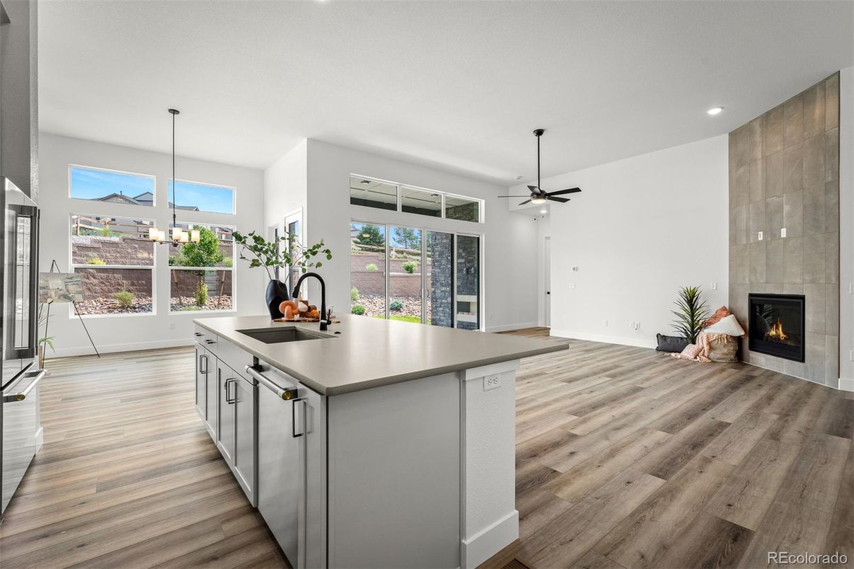 Fireplace, Interior, Kitchen, Pendant Lights, Recessed Lighting, Wood Texture Flooring