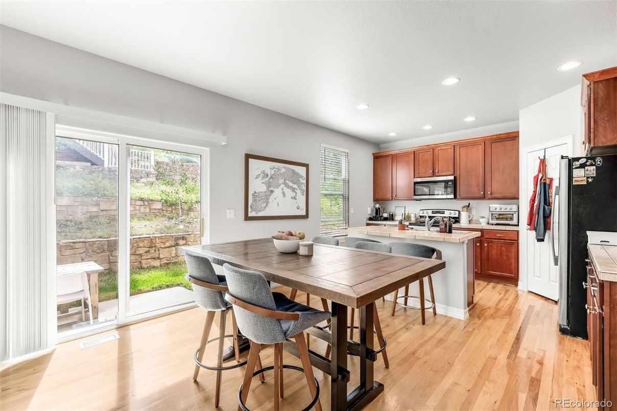 Dining room, Interior, Kitchen, Recessed Lighting, Stainless Steel Appliances, Wood Texture Flooring