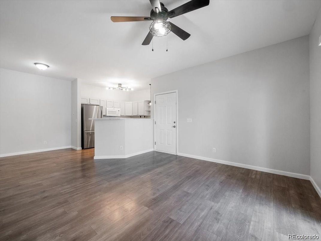 Empty room, Interior, Kitchen, Stainless Steel Appliances, Wood Texture Flooring